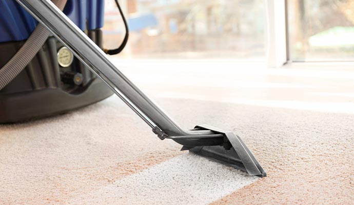 professional carpet cleaning by vaccum cleaner